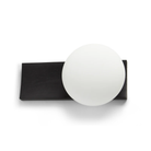 The black painted ash Dew Cordless Table Lamp & Wall Sconce from Woud from a top view.