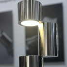 The MOMENT Cordless Lamp from Y.S.M shown in an art gallery. all-groups