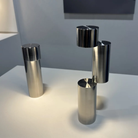 The MOMENT Cordless Lamp from Y.S.M in a home office showing two of the configurations on top of a table. all-groups