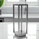The antique nickel Home Cordless Lamp from Zafferano on a kitchen counter.