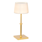 The matte gold Poldina Classic Cordless Lamp from Zafferano.