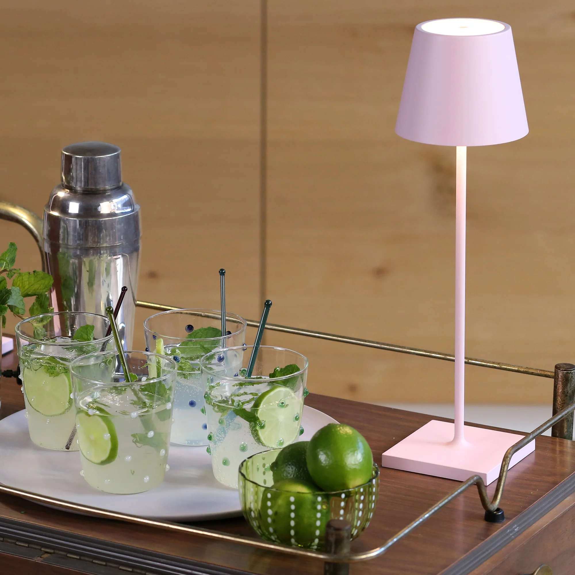 The pink Poldina Pro from Zafferano on top of a bar cart with drinks.