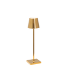 The glossy gold Poldina Pro Micro Cordless Lamp from Zafferano.